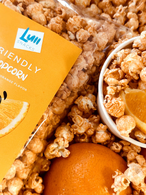 Friendly popcorn with juicy orange flavour